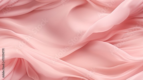  a close up of a pink fabric with a very large amount of ruffled fabric on top of the fabric. photo