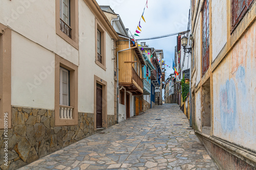 Colorful street in the town of Navia, Spain © vli86