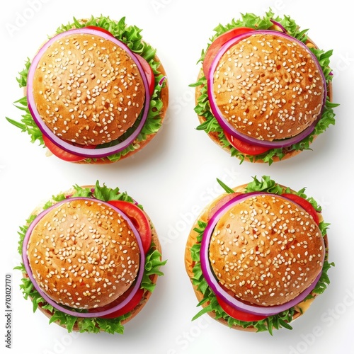Four Hamburgers with Fresh Lettuce and Tomato Slices