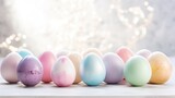  a row of different colored eggs sitting on top of a wooden table next to a firework effect in the background.