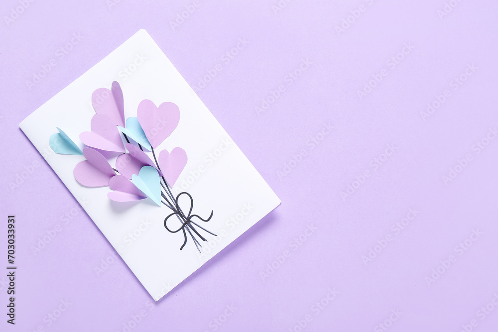 Beautiful greeting card for Valentine's Day celebration on lilac background
