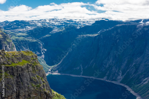 Amazing cliff over the Ringedalsvatnet lake in Trolltunga mounatin area, Norway