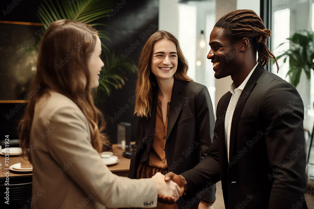 Business meeting between man and woman in office workplace environment interview hire enrol introduce or conclude deal introduce each other in casual happy relaxed atmosphere