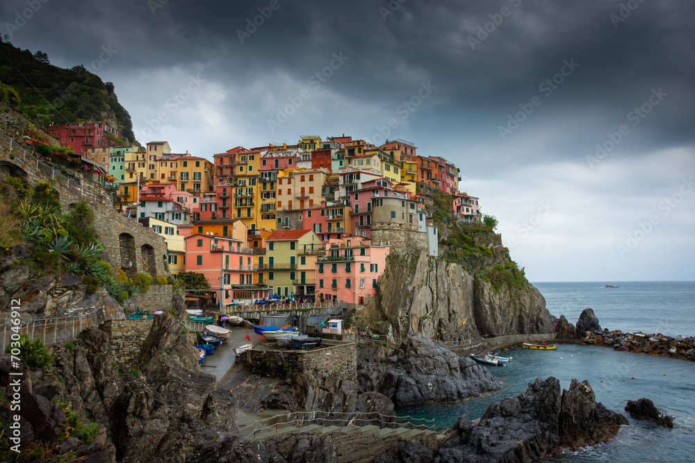 Dramatic landscape of Manarola under the rain, Cinque Terre, Liguria,  Italy