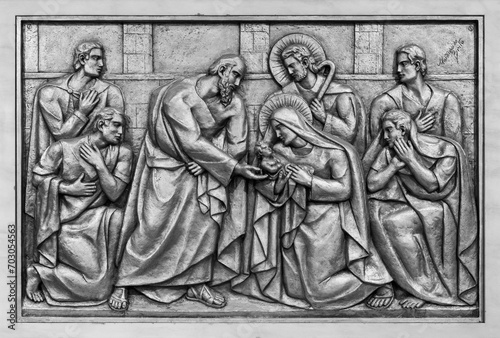 The Presentation of Jesus in the Temple – Fourth Joyful Mystery. A relief sculpture in the Basilica of Our Lady of the Rosary of Fatima. 10 Aug 2023. photo