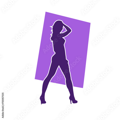 Silhouette of a young slim female model in tight outfit. Silhouette of a slim woman in feminine pose. 