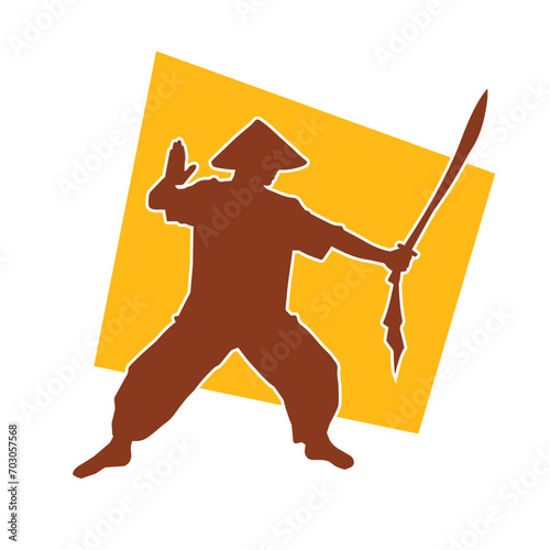 Silhouette of a sword warrior in action pose. Silhouette of a martial art person carrying sword weapon.