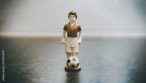 Vintage soccer child player figurine