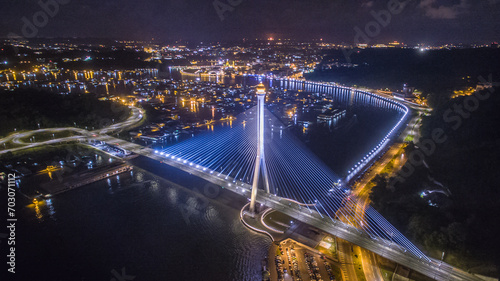 aerial view of Sungai Kebun Bridge with the water village at Bandar Seri Begawan, Brunei Darussalam. night shot photo