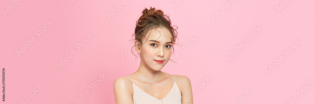 Portrait of attractive young woman over pink background Portrait of attractive young woman over pink background