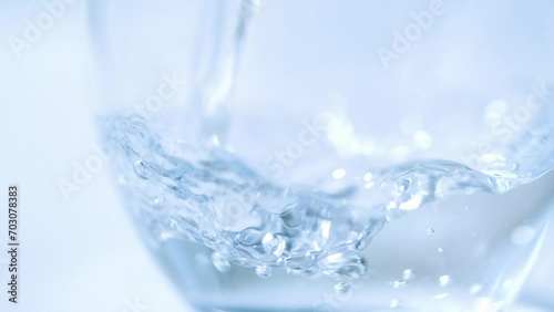 High speed shooting, close-up, clear, mineral water, pour, cup