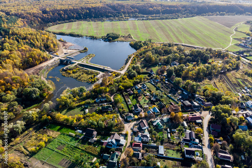 Aerial view of the countryside near the reservoir on the river. Dam on the Protva River, Borovsk, Russia photo