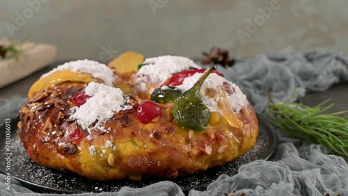 Bolo Rei or Kings Cake is a traditional Xmas cake with fruits raisins nut and icing on kitcthen countertop. Is made for Christmas, Carnavale or Mardi Gras