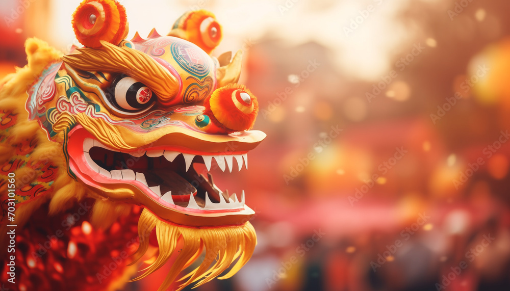 Fototapeta premium Beautiful decorated dragon performing traditional Chinese New Year dragon dance