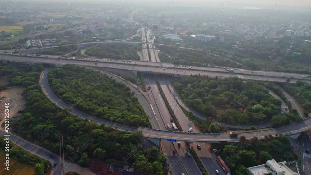 Aerial shot of elevated highway road junctions. The Intersecting