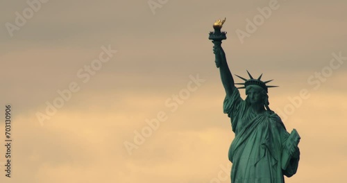 Statue of Liberty Close-up with Orange Sky