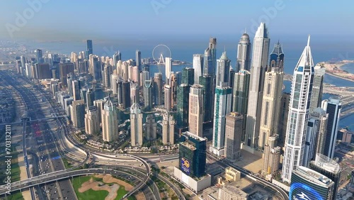 Aerial view of Dubai Marina. Dubai Marina is an affluent residential neighborhood known for The Beach. photo