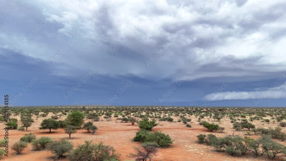 Aerial panning shot of storm clouds building in the Southern Kalahari. Aerial panning shot of storm clouds building in the Southern Kalahari.
