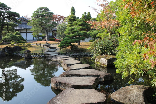 Autumn leaves and pond in the Garden of the Lord's Residence in Koko-en Garden, Himeji, Japan