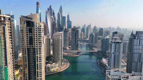Aerial view of Dubai Marina. Dubai Marina is an affluent residential neighborhood known for The Beach at JBR.