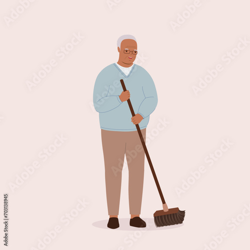 One Smiling Black Senior Man Sweeping Floor With A Broom. Full Length.