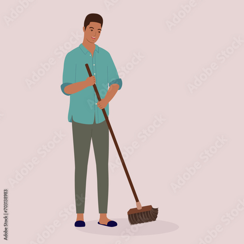 One Smiling Black Man Sweeping Floor With A Broom. Full Length.