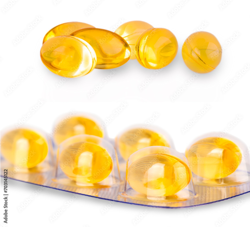 Set of Yellow color soft gelatin capsules on white background. Concept of medicine, drug, nutrition supplement