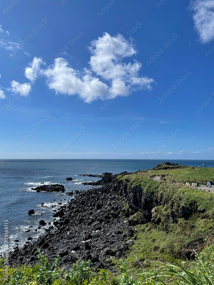 Clear skies, seas and cliffs. Meadows on the island. Beautiful natural scenery