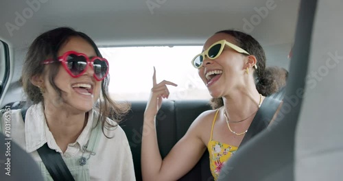 Car, singing and happy friends on a road trip, excited adventure and holiday with transport. Young women or gen z people in sunglasses for travel, vacation and dance with energy and laughing together photo