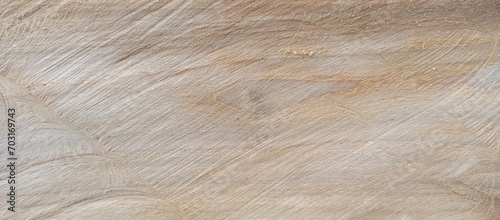 Surface of a beige wooden material as a background