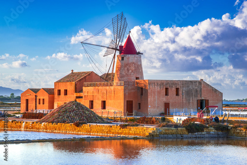 Marsala, Italy. Stagnone Lagoon with vintage windmills and saltwork, Trapani province, Sicily. photo