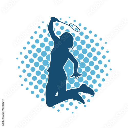 Silhouette of female badminton athlete in action pose. Silhouette of a slim woman playing badminton sport.