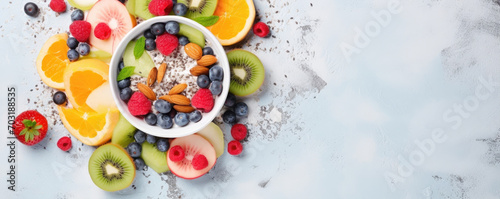 Top view photo of mix of fresh fruit and nuts on white background, healthy food concept