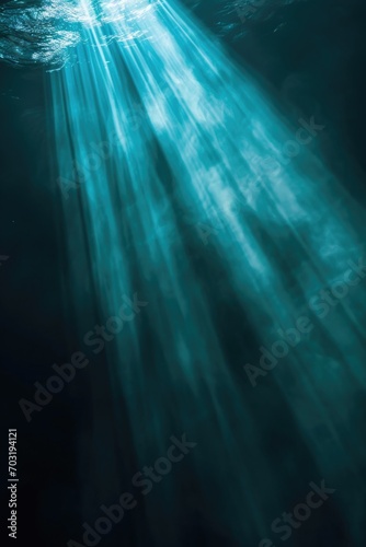 Sun shining brightly through water rays, perfect for underwater photography or capturing the beauty of nature © Fotograf