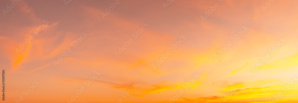 Sunset Sky on Twilight in the winter Evening with Orange Gold Sunset Cloud Nature Colorful Sky Backgrounds, Horizon Golden Sky, Gorgeous.