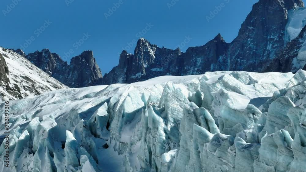 Aerial Panning Beautiful View Of Snowcapped Rock Formations Against Clear Sky On Sunny Day - French Alps, France Aerial Panning Beautiful View Of Snowcapped Rock Formations Against Clear Sky On Sunny Day - French Alps, France