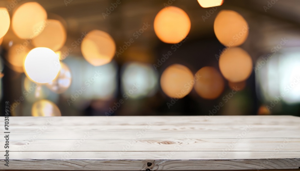 Wooden table in front of abstract blurred background of restaurant lights Wooden table in front of abstract blurred background of restaurant lights