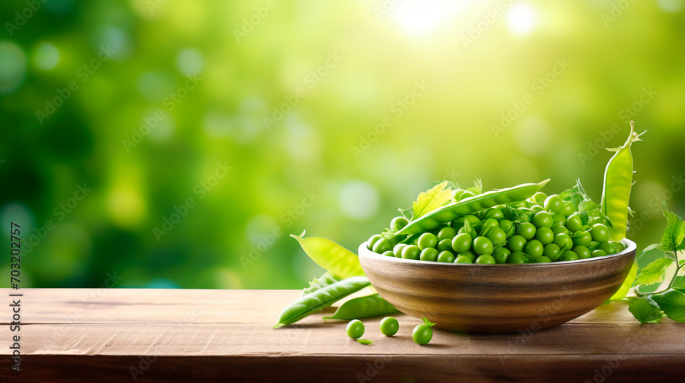 Green peas in a bowl against the backdrop of the garden. Selective focus. Green peas in a bowl against the backdrop of the garden. Selective focus.