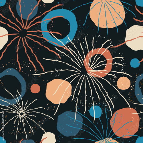 Seamless pattern with colorful fireworks on a dark background. Pattern on a dark background for holiday packaging. Bright sparks of fireworks for fabric design. Flat vector illustration.