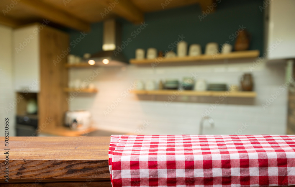 Cloth napkin on wood table with glass window background.for disign product display. High quality photo Cloth napkin on wood table with glass window background.for disign product display. High quality photo