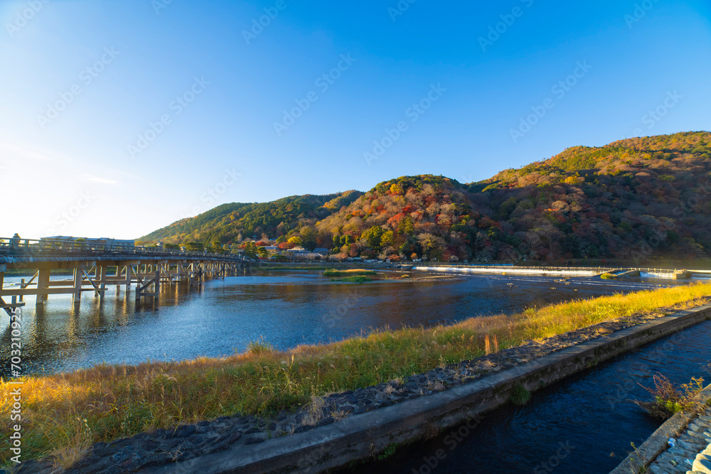 Togetsukyo bridge near Katsuragawa river in Kyoto in autumn wide shot