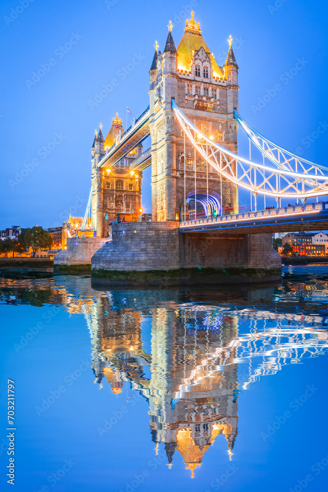London, United Kingdom. Tower Bridge, illuminated dusk over River Thames