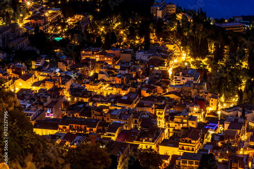 Beautiful view of night town of Italy with colorful golden lights  night landscape on city of Europe