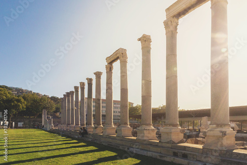 Colonnade of Agora in ancient Smyrna as seen against summer light at sunset. Izmir, Turkey (Turkiye) photo