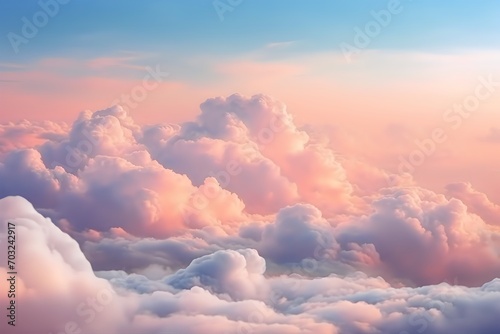 clouds with pink, yellow and blue colors above the clouds photo
