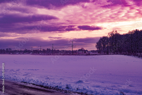 Sunset over winter landscape in Hassleholm, Sweden © StellaSalander