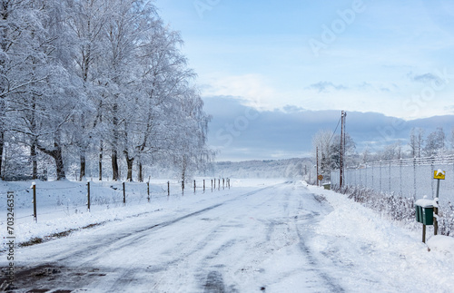 Winter road where the maximum speed is 30 kilometers per hour in Hassleholm, Sweden © StellaSalander