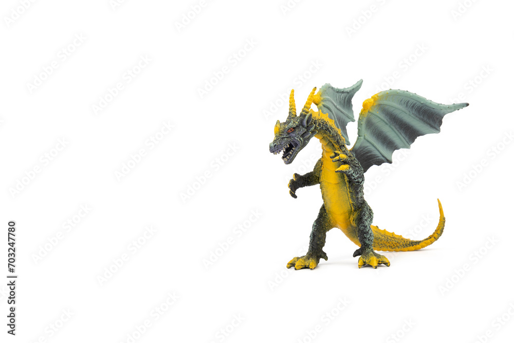 Fototapeta premium Plastic dragon toy on white background. The Simbol of new year 2024.