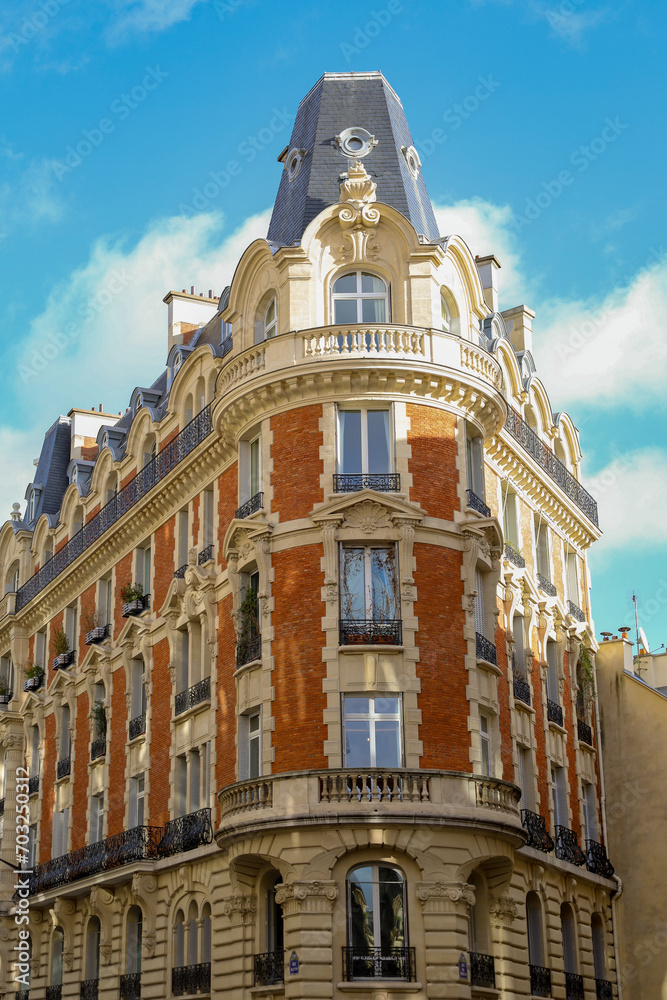 real estate , haussmannian architecture in Paris , red bricks facade