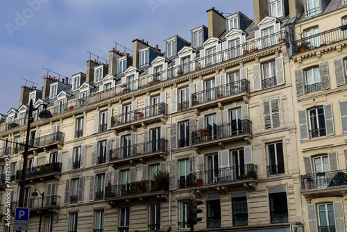 typical parisians building facade , haussmannian style , 2nd arrondissement